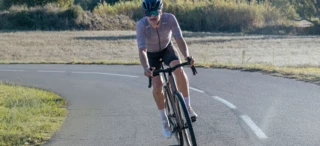 A man riding a road bike