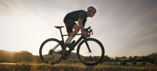 Side shot of a racing cyclist